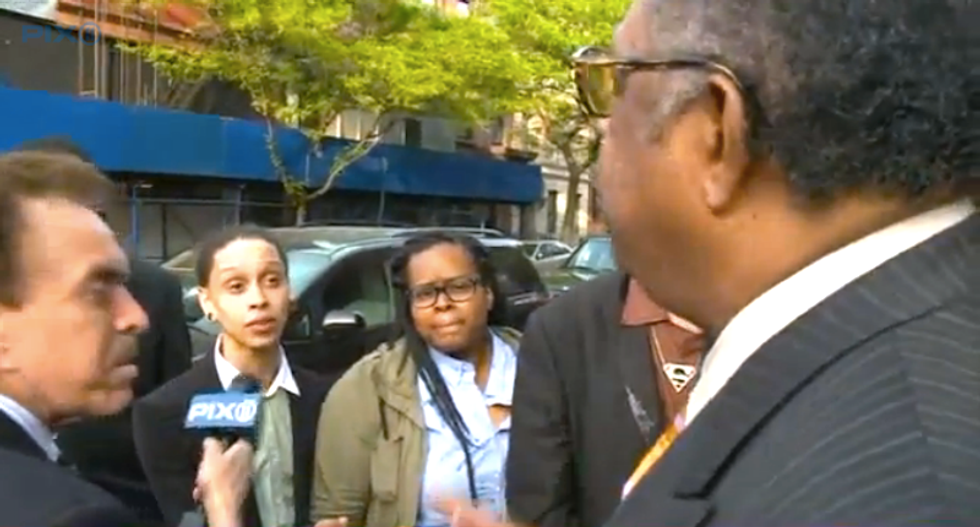 WATCH: Angry neighbors call out gay-hating Pastor Manning for absurd slogans outside Harlem church