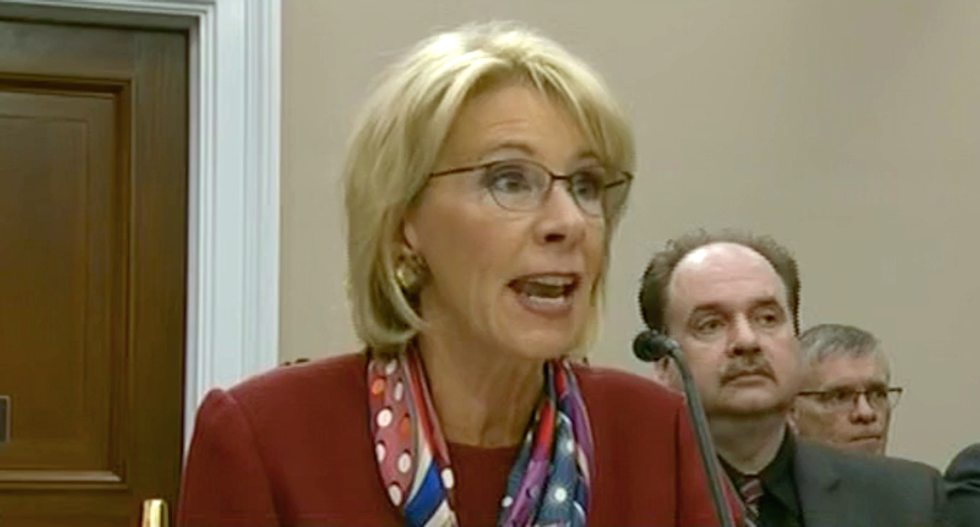 WATCH: Betsy DeVos squirms as congresswoman grills her over school shootings and arming teachers