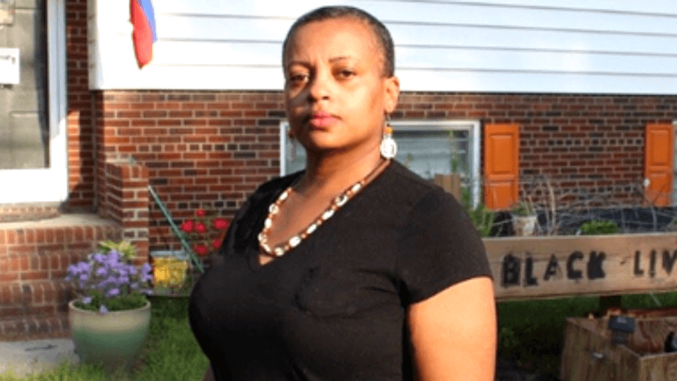 WATCH: Over 9 Police raided a black woman's home for playing Malcolm X speeches too loudly