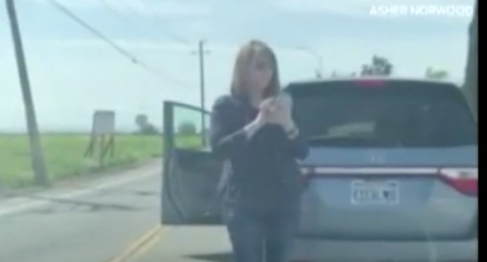 ‘Go back to the ghetto!’ Raging white woman attacks black man as he drives home from church