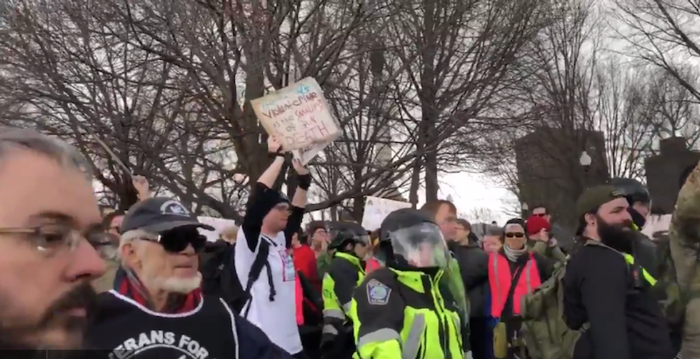 Armed white men showed up to intimidate kids at #MarchForOurLives rallies -- it didn't work