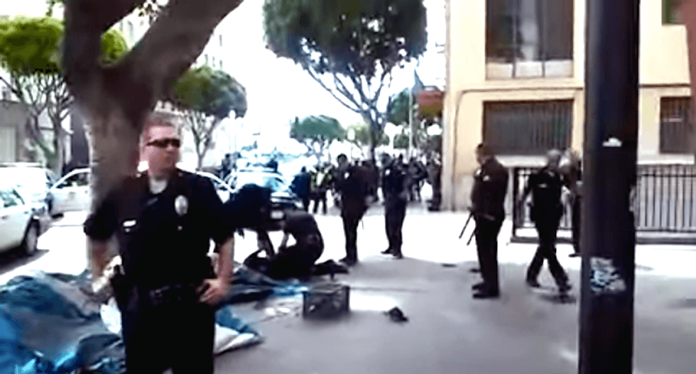 Mentally ill woman faces life in prison for picking up LA cop's baton during fatal struggle with homeless man