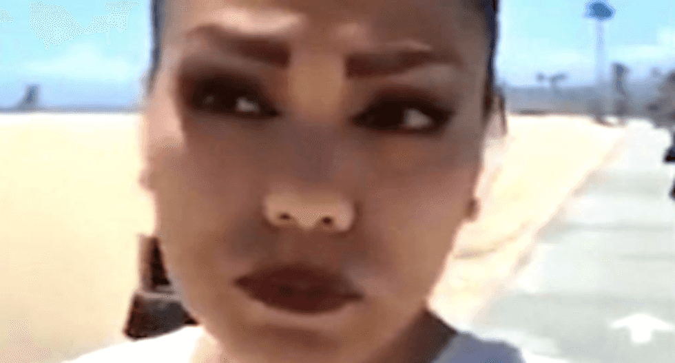 WATCH: Crazed racist woman invades Latina's meditation session on California boardwalk