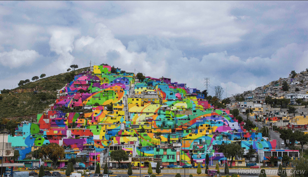 Street artists transform crime-ridden Mexican neighborhood into giant rainbow mural