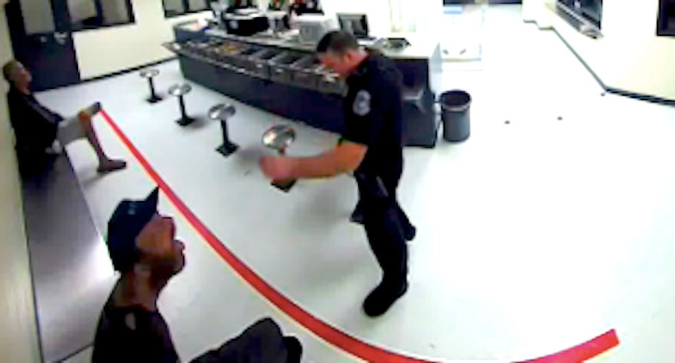 WATCH: Florida cop feeds drunken inmate like a zoo animal while barking 'dog commands'