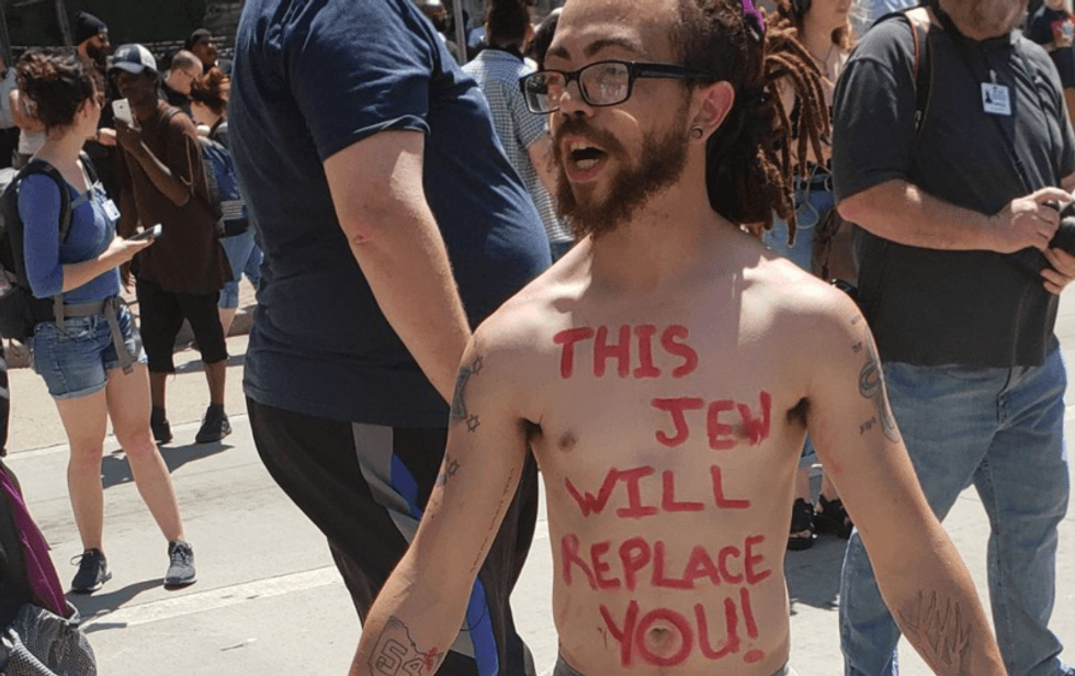 Here are the best anti-KKK counter-protester signs as racists descend upon Dayton for a rally