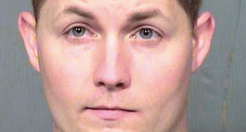 Arizona detention officer charged with punching unruly inmate jailed on minor charge