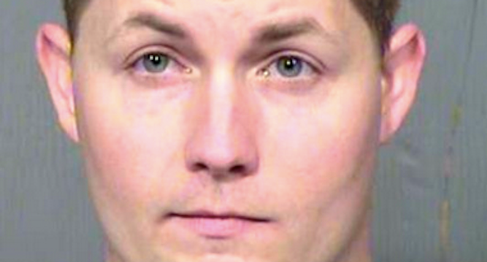 Arizona detention officer charged with punching unruly inmate jailed on minor charge