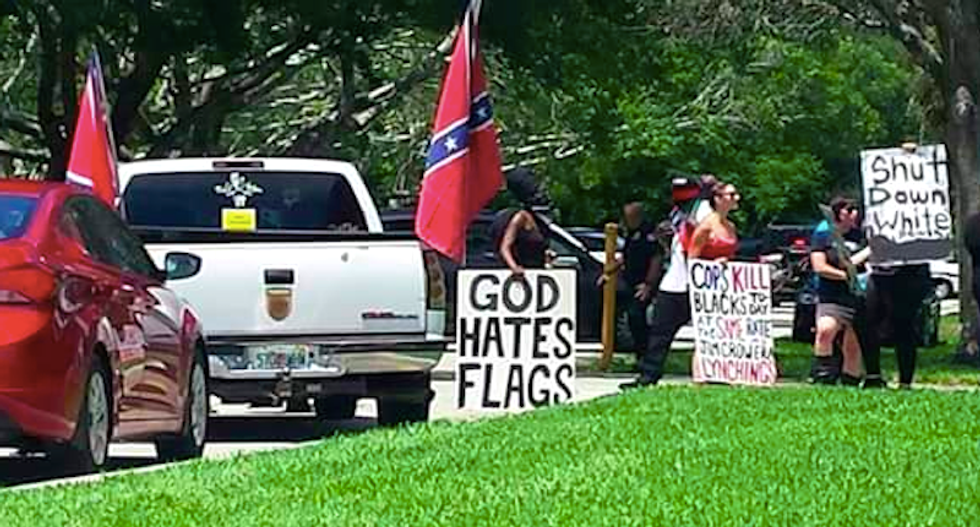 Confederate flag-loving bikers wave guns and knives at Black Lives Matter protesters during Florida rally