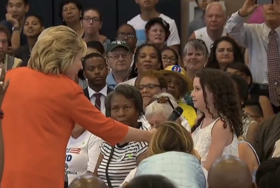 Little girl asks Hillary Clinton: When you're president, will you get paid as much as a man?