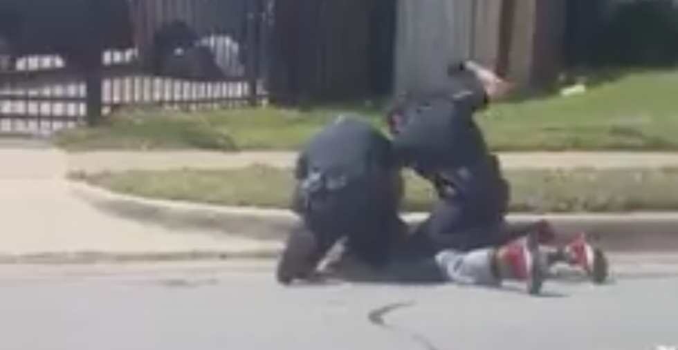 Watch: Drive-by video shows Texas cop beating a man pinned to the ground