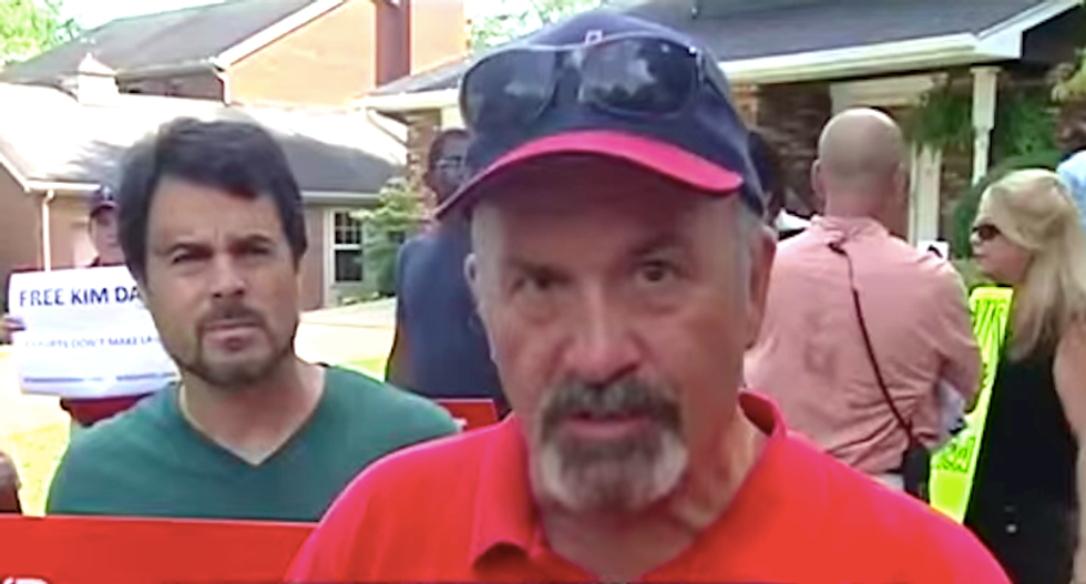 Kim Davis supporters gather outside judge's home to hold him 'in contempt of God's court'