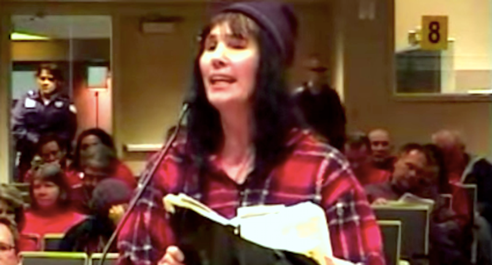 WATCH: Tampon-waving woman demands officials protect her right to speak in tongues amid anti-gay rant