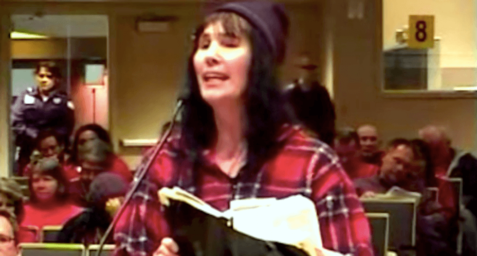 WATCH: Tampon-waving woman demands officials protect her right to speak in tongues amid anti-gay rant
