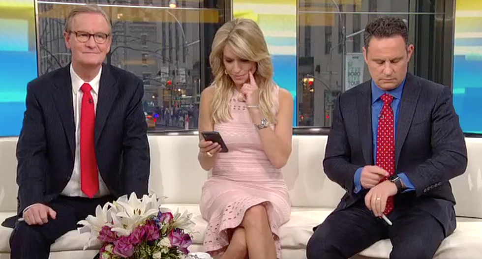 Fox News host forced to look up ‘oligarchy’ on live TV to explain latest Russia news