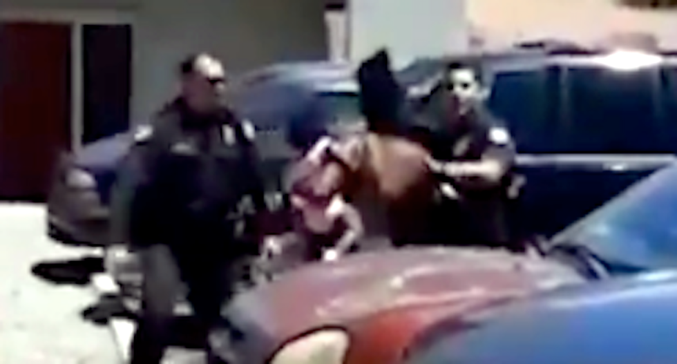 WATCH: Arizona cops terrorize black family at gunpoint after 4-year-old takes Barbie doll from dollar store