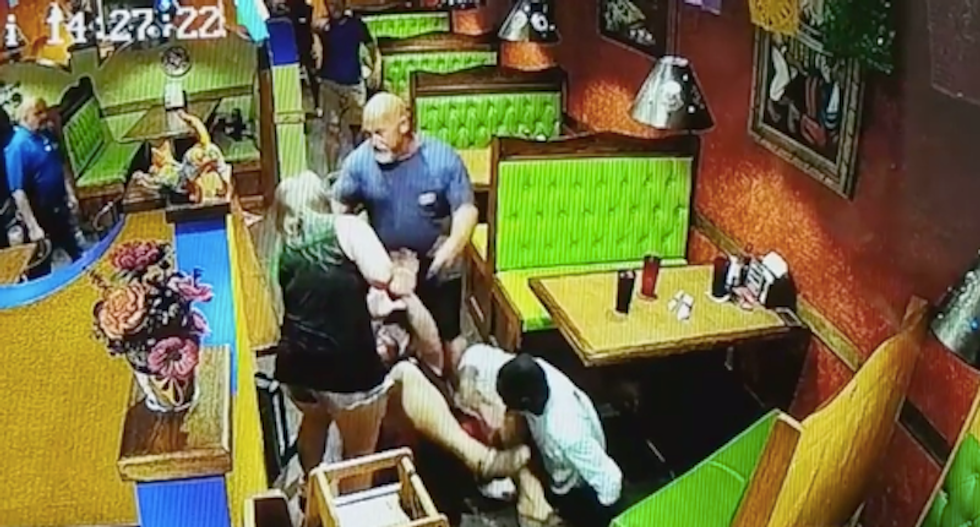 WATCH: Florida cop arrested along with son after punching woman in wild restaurant brawl