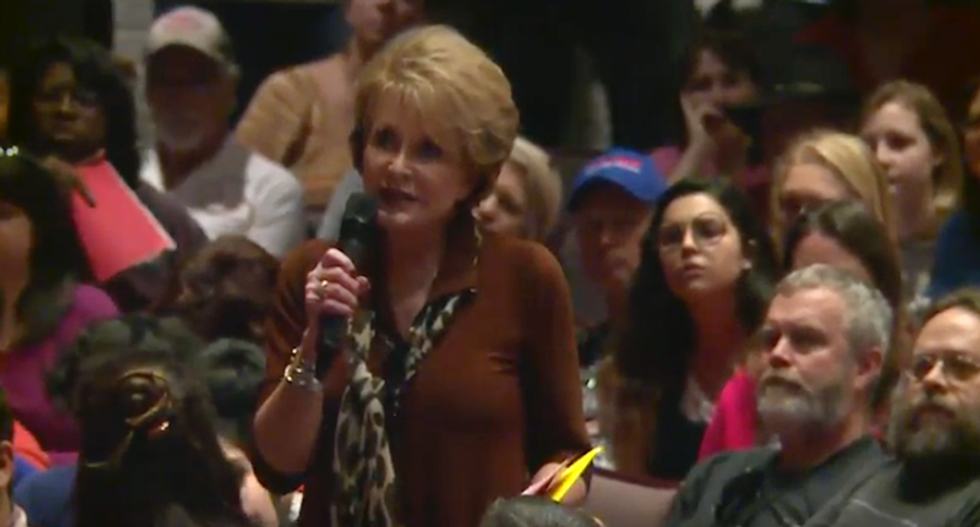 'I'm not a paid protestor': Crowd erupts in cheers when voter confronts GOP senator at town hall