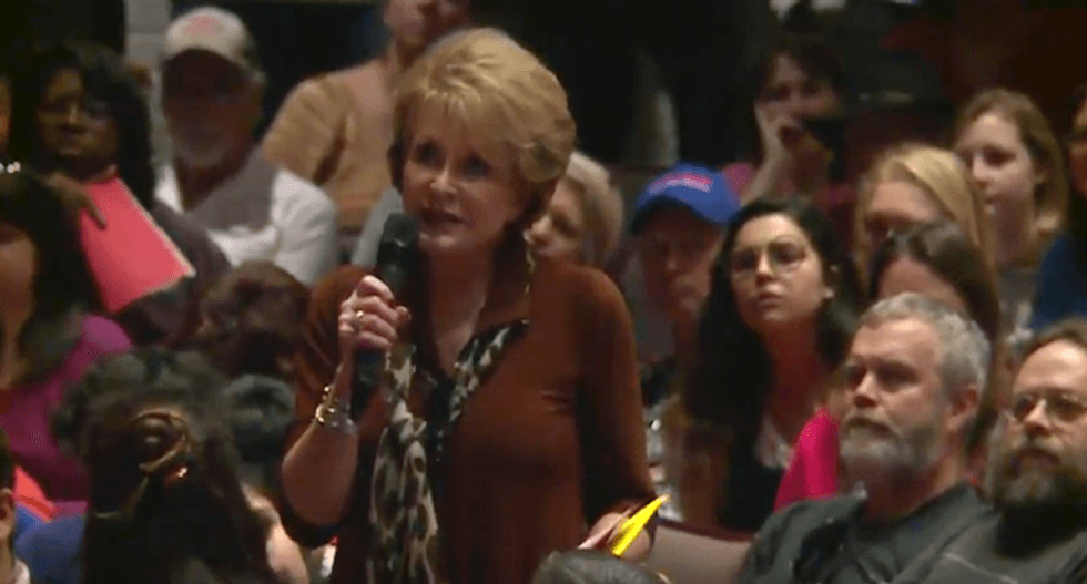 'I'm not a paid protestor': Crowd erupts in cheers when voter confronts GOP senator at town hall