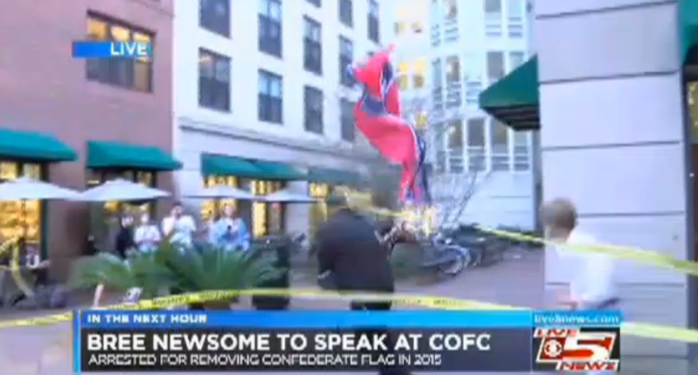 WATCH: Black Lives Matter organizer grabs protester’s Confederate flag on live TV newscast