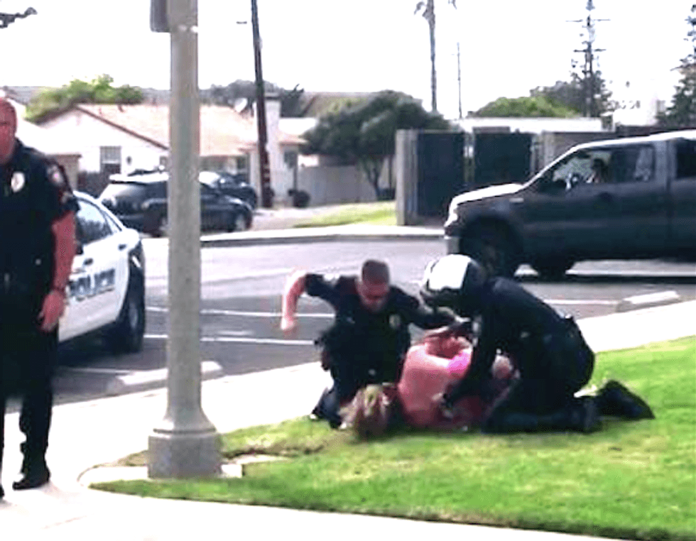 Video shows California cops punching unarmed woman in brutal arrest -- for a seatbelt violation