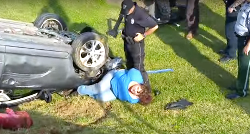 ‘Shoot her *ss’: Crowd urges NC cops to 'manhandle' woman ranting about Jesus after bizarre crash