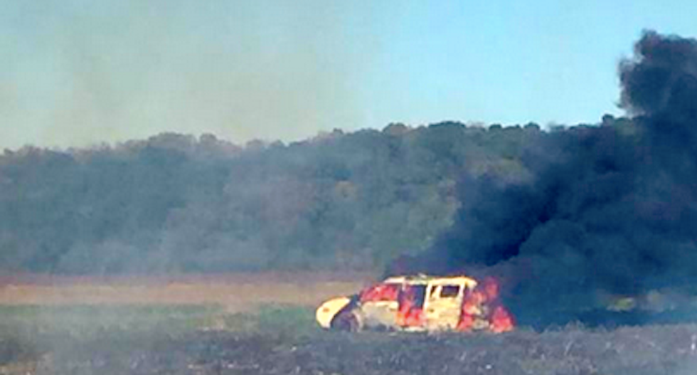 Missouri dumbass tries to put out garbage fire with van -- loaded with guns, ammo and gasoline