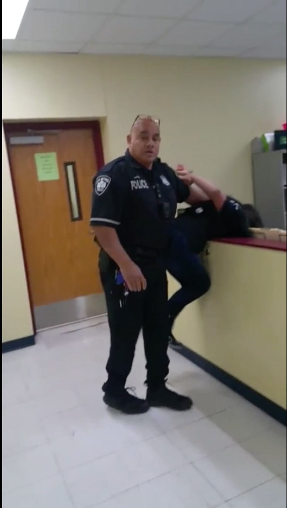 WATCH: Texas cop drags a handcuffed teen girl across a school counter for 'mouthing off'