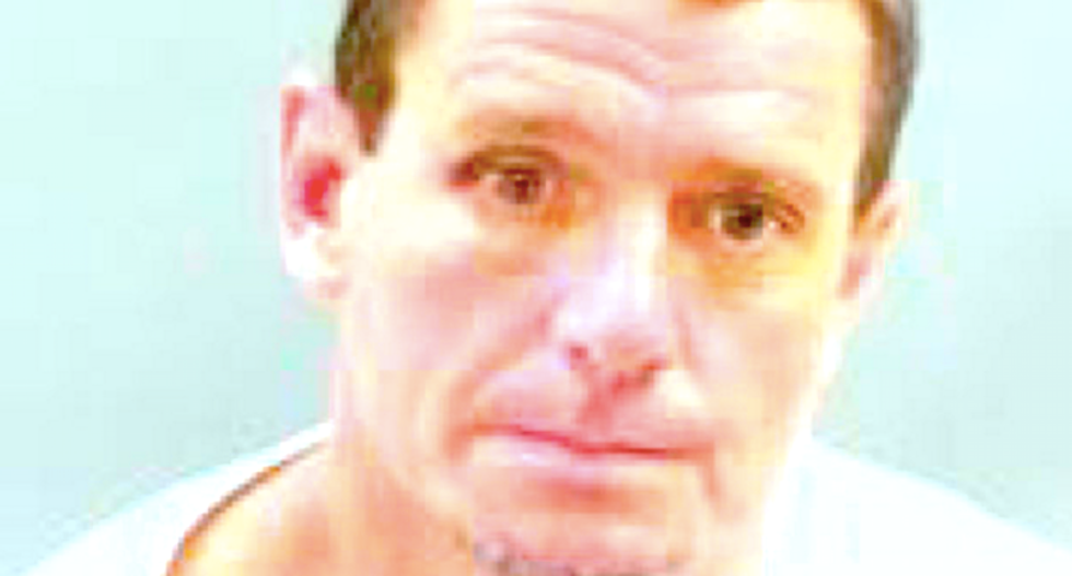 St. Louis cop beat cuffed suspect and shoved gun down his throat -- and prosecutors covered it up