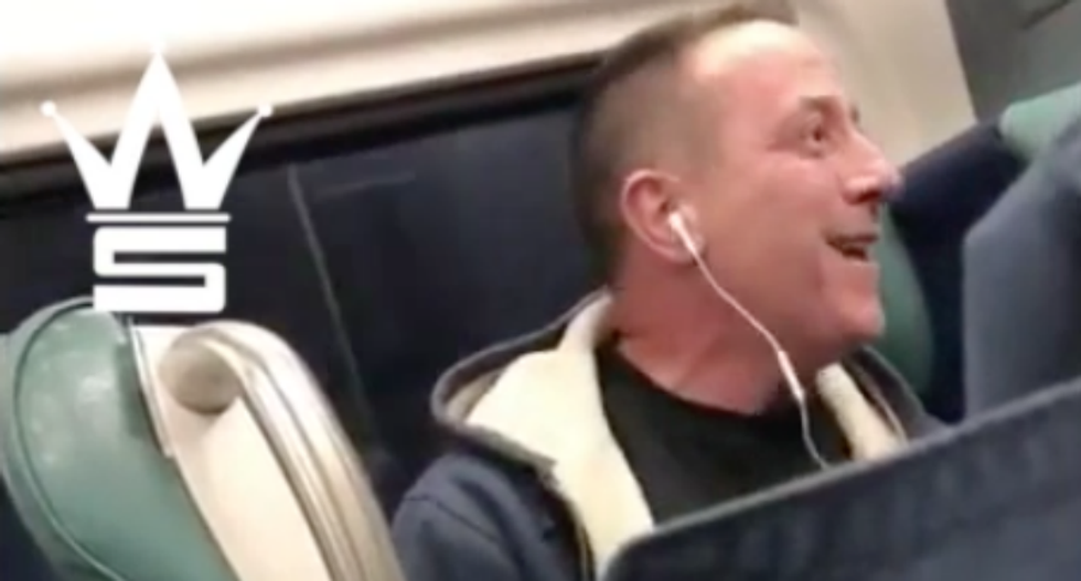 White commuter calls a black passenger a 'f*cking monkey' in racist NYC train rant