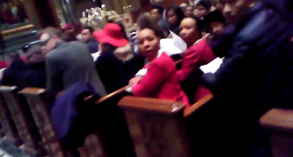 WATCH: Unhinged Trump supporter interrupts church mass to scream about fringe PizzaGate conspiracy