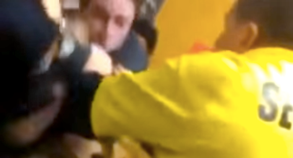 WATCH: Nebraska cop pummels teen while trying to break up fight at high school