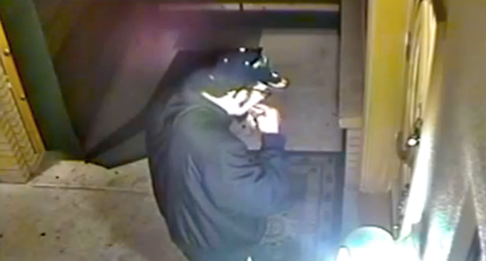 WATCH: Vandal shoves raw bacon in his mouth while defacing Las Vegas mosque