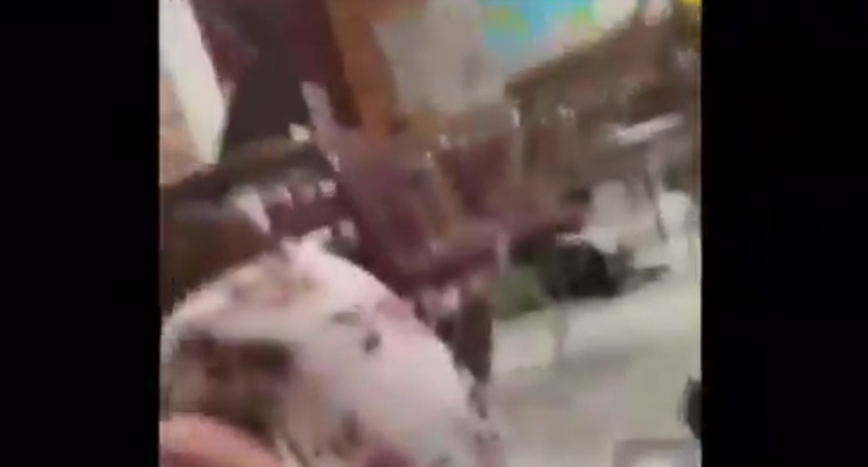 Disturbing footage shows Marjory Stoneman Douglas High students as gunshots ring out in the building
