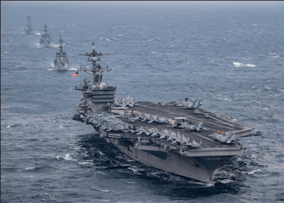 Russia and China send ships to chase US carrier in waters off Korean peninsula as tensions mount