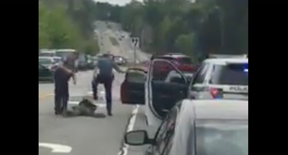 'Blood splattered everywhere': Disturbing footage shows cop stomping on handcuffed black man's face