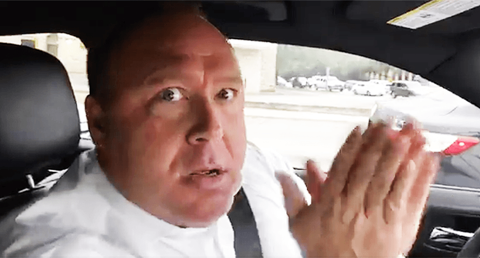 WATCH: Alex Jones swears he's not a 'performance artist' in off-the-rails rant on his way to divorce court