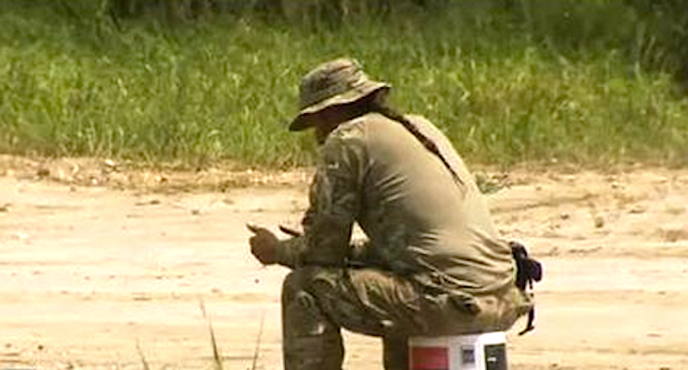 Militiaman who came under border patrol fire was illegally carrying a gun, records show