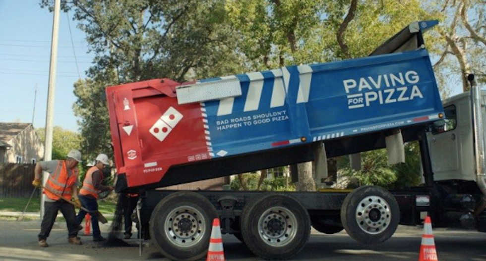 Domino's pledges to fix America's crumbling infrastructure with 'paving for pizza' marketing ploy
