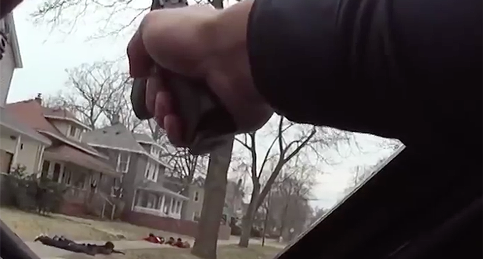 'Stop crying, bro! They gonna think we did something!': Unarmed black teens sob as cop holds them at gunpoint