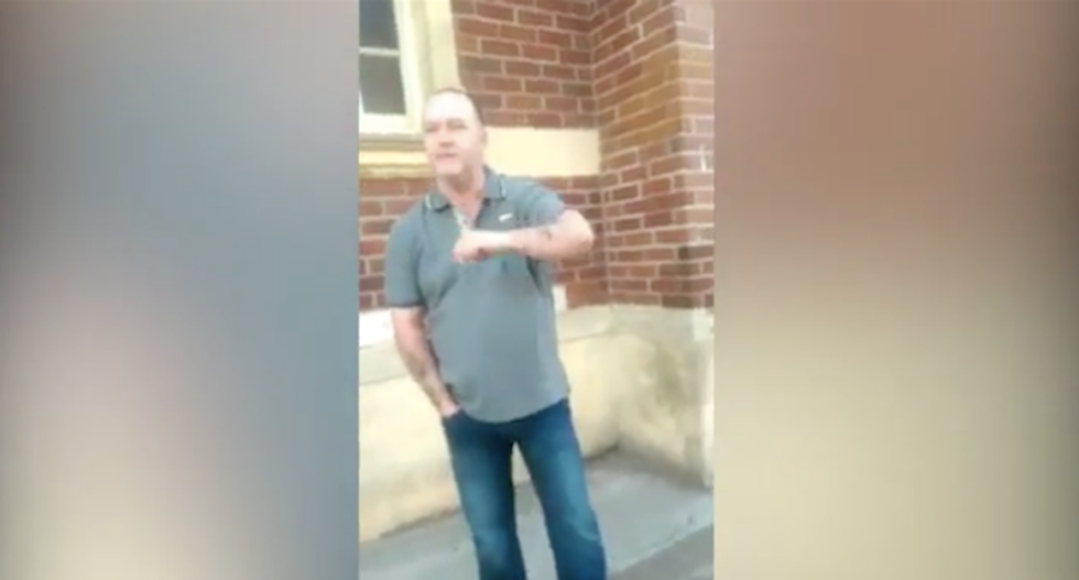 Racist man mocked as a coward after filming himself using a spray bottle to harass a Muslim woman
