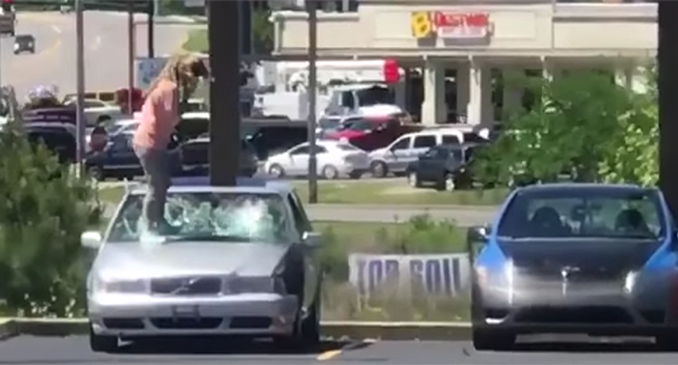 ‘I prayed about it and stuff’: Alabama woman stomps out car windshield after ‘night of thinking’