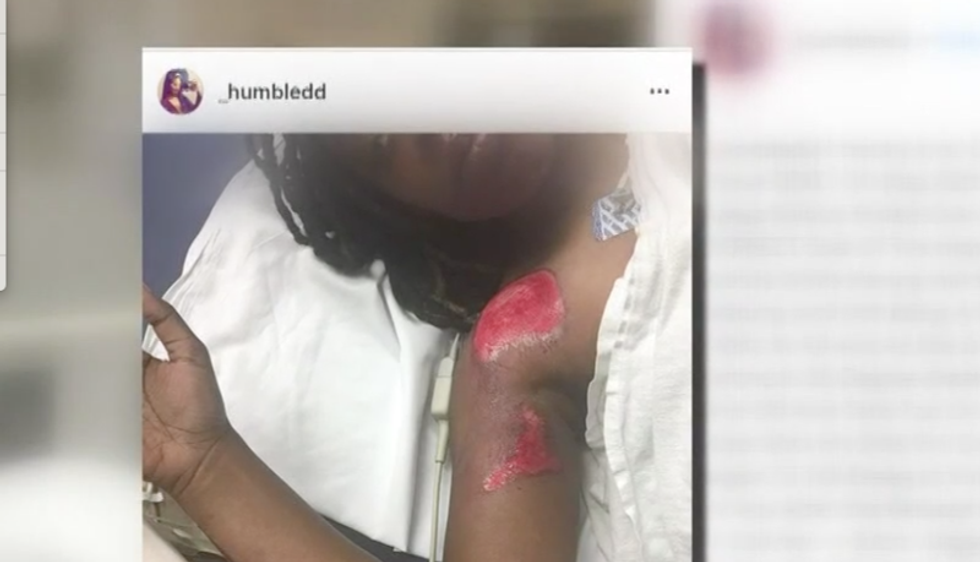 White racist hits black woman with his truck and drags body across the road -- police charge her with obstructing traffic