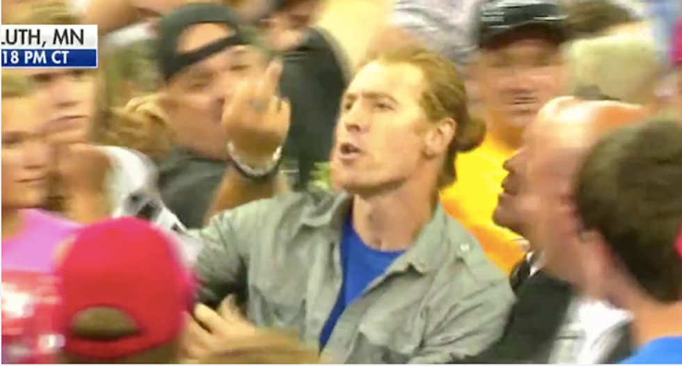 Protester targeted by Trump for his 'long hair' calls him out again for palling around with a pedophile