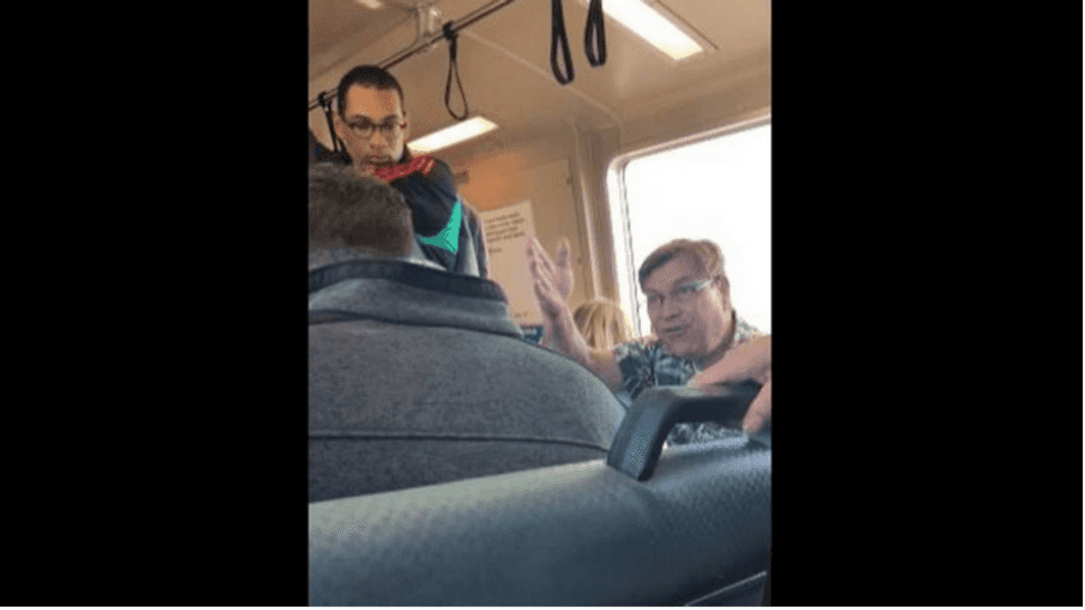 WATCH: White man freaks out over burrito-eating train passenger -- and calls the cops
