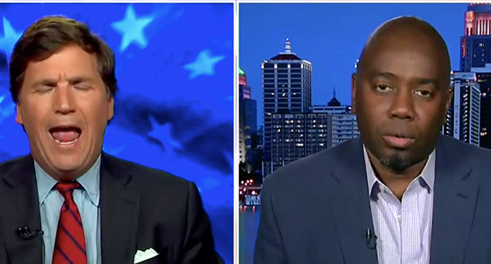 Watch Tucker Carlson lose it at a black writer who wants to force Fox News viewers to understand race
