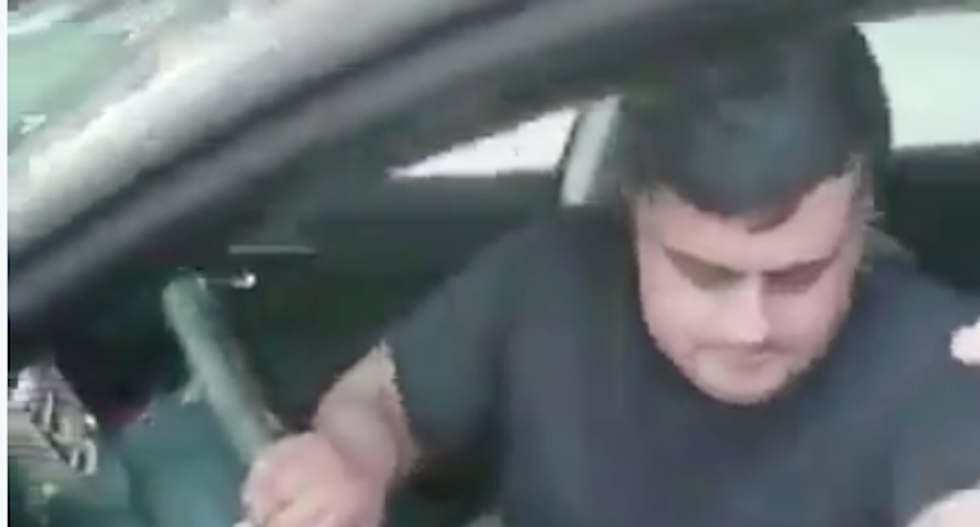 Watch: Drunk off-duty cop hits a man in his car then punches him in the face