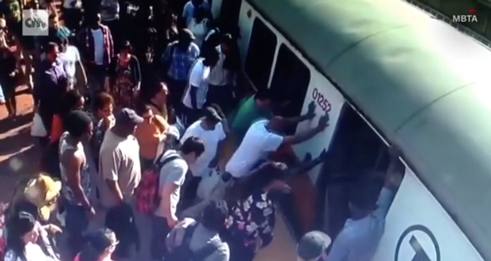 Woman begs bystanders not to call ambulance due to expense after being trapped and injured by subway car
