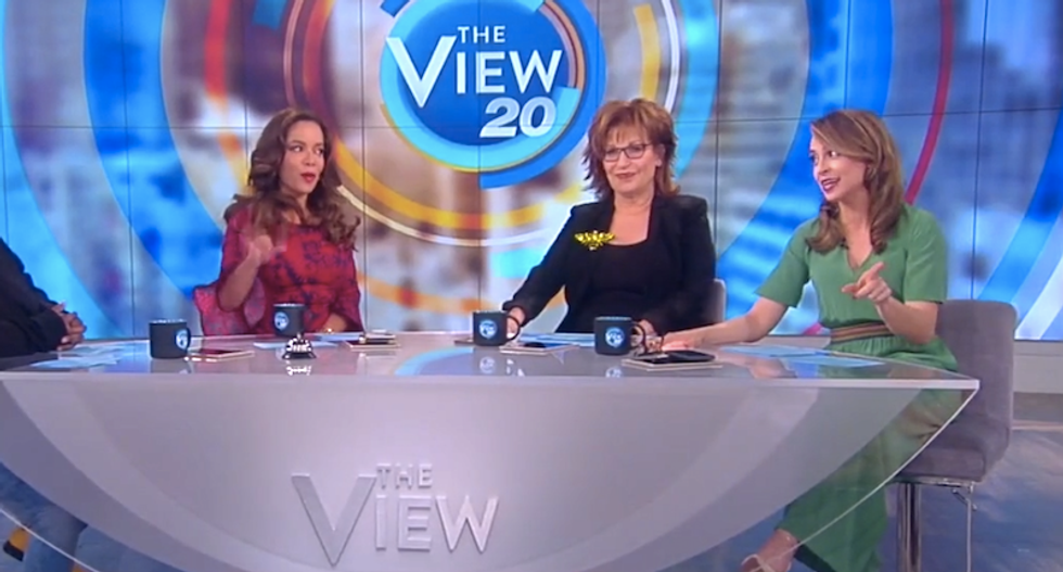 'She can't stand him': The View mocks video showing Melania slapping away Trump's hand