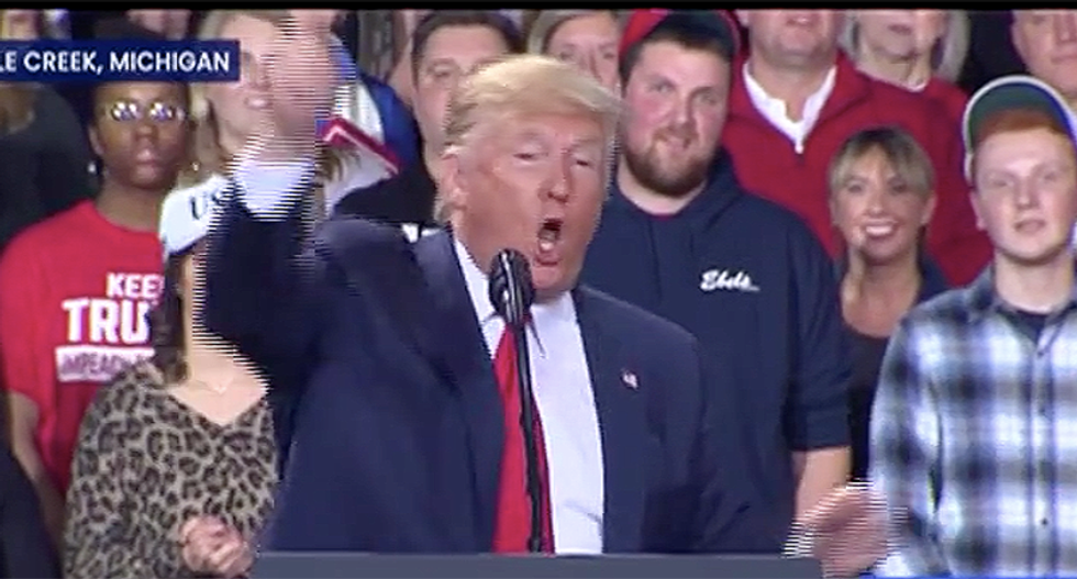 WATCH: Protester gives Trump the finger at rally as security drags him out over ‘you’re fired’ banner